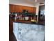 Kitchen with granite countertops, wood cabinets and stainless steel appliances at 10319 Boyette Creek Blvd, Riverview, FL 33569