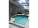 Screened-in pool area with concrete decking at 10319 Boyette Creek Blvd, Riverview, FL 33569