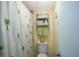 Simple bathroom with shower/tub combo and palm tree-themed shower curtain at 11485 Oakhurst Rd # A203, Largo, FL 33774