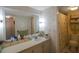 Bathroom with vanity, sink, toilet, and shower at 11485 Oakhurst Rd # A203, Largo, FL 33774