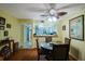 Dining room with round table and four chairs at 11485 Oakhurst Rd # A203, Largo, FL 33774