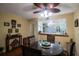 Bright dining room with a table for four and kitchen views at 11485 Oakhurst Rd # A203, Largo, FL 33774
