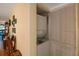 Compact laundry closet with stacked washer/dryer at 11485 Oakhurst Rd # A203, Largo, FL 33774