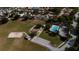 Aerial view of a park and recreation area with a pool and playground at 12518 Midpointe Dr, Riverview, FL 33578