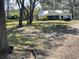 Single Gathering home with large yard and mature trees at 1315 Cowart Rd, Plant City, FL 33567