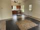 Open floor plan with kitchen island and pebble accent in dining area at 1315 Cowart Rd, Plant City, FL 33567