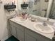 Double vanity bathroom with granite countertop at 3509 Maple Grove Way, Plant City, FL 33565