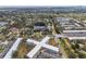 Aerial view showcasing apartment complex and surrounding neighborhood at 4300 58Th N St # 1907, Kenneth City, FL 33709