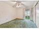 Empty bedroom with carpeted floor and ceiling fan at 4300 58Th N St # 1907, Kenneth City, FL 33709