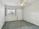 Bright bedroom with carpet, ceiling fan and window coverings at 4300 58Th N St # 1907, Kenneth City, FL 33709