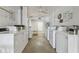 Clean laundry room with multiple washers and dryers at 4300 58Th N St # 1907, Kenneth City, FL 33709