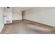 Spacious living room with large window and wall shelving at 4300 58Th N St # 1907, Kenneth City, FL 33709