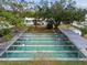 Community shuffleboard courts with covered areas at 4300 58Th N St # 1907, Kenneth City, FL 33709