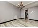 Elegant dining room featuring hardwood floors and a chandelier at 436 Lafayette Blvd, Oldsmar, FL 34677