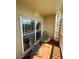 Private balcony with table and chairs at 1216 S Missouri Ave # 317, Clearwater, FL 33756
