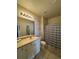 Bathroom with shower/tub combo and vanity at 1216 S Missouri Ave # 317, Clearwater, FL 33756