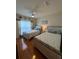 Bedroom with two twin beds and wood floors at 1216 S Missouri Ave # 317, Clearwater, FL 33756