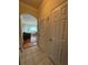 Bright hallway with access to living area and storage at 1216 S Missouri Ave # 317, Clearwater, FL 33756