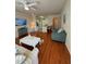 Living room with hardwood floors and open kitchen at 1216 S Missouri Ave # 317, Clearwater, FL 33756