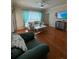 Living room with hardwood floors and open kitchen at 1216 S Missouri Ave # 317, Clearwater, FL 33756