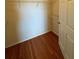 Walk-in closet with wire shelving and wood floor at 1216 S Missouri Ave # 317, Clearwater, FL 33756