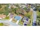 Aerial neighborhood view showing the location of the property among other homes at 6085 Fall River Dr, New Port Richey, FL 34655