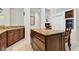 Close up of kitchen island featuring granite countertop and custom wood cabinets at 106 Rosana Dr, Brandon, FL 33511