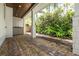 Brick pathway and gravel landscaping alongside the home at 1615 Santa Barbara Dr, Dunedin, FL 34698