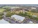 Wider aerial view of apartment building and surrounding area at 2632 River Preserve Ct, Bradenton, FL 34208