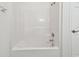 White bathtub and shower combination at 2632 River Preserve Ct, Bradenton, FL 34208