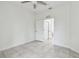 Spacious bedroom with ceiling fan and tile floor at 2632 River Preserve Ct, Bradenton, FL 34208