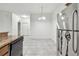 Bright dining area with tile floors and kitchen views at 2632 River Preserve Ct, Bradenton, FL 34208