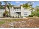 Condo building exterior with stairs and landscaping at 2632 River Preserve Ct, Bradenton, FL 34208