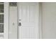 Front entrance with white door and address number at 2632 River Preserve Ct, Bradenton, FL 34208