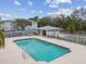 Community pool with surrounding patio and fenced area at 2632 River Preserve Ct, Bradenton, FL 34208