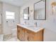 Modern bathroom with double vanity and stylish light fixtures at 1948 Jeffords St, Clearwater, FL 33764