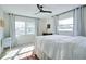 Well-lit bedroom with a queen-size bed and hardwood floors at 1948 Jeffords St, Clearwater, FL 33764