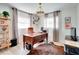 Bright home office featuring a large desk and hardwood floors at 1948 Jeffords St, Clearwater, FL 33764