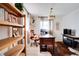 Spacious home office with built-in shelves and a large desk at 1948 Jeffords St, Clearwater, FL 33764