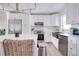 Modern kitchen with island, white cabinets, and stainless steel appliances at 1948 Jeffords St, Clearwater, FL 33764