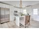Bright kitchen with stainless steel appliances and white cabinets at 1948 Jeffords St, Clearwater, FL 33764