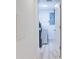 Bright laundry room with washer, dryer, and storage cabinets at 1948 Jeffords St, Clearwater, FL 33764