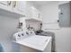 Clean laundry room featuring a Whirlpool washer and dryer at 1948 Jeffords St, Clearwater, FL 33764