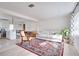 Bright living room with large windows and area rug at 1948 Jeffords St, Clearwater, FL 33764