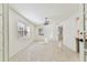 Bright dining room with large windows and terrazzo flooring at 3322 W Dorchester St, Tampa, FL 33611