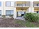 View of the patio with chairs facing the ocean in the background at 6322 Palma Del Mar S Blvd # 106, St Petersburg, FL 33715