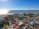 Aerial view of beachfront property, showcasing ocean views and nearby buildings at 12000 Gulf Blvd # 501-W, Treasure Island, FL 33706