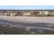 Aerial view of the property and surrounding beach area at 12000 Gulf Blvd # 501-W, Treasure Island, FL 33706
