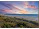 Stunning sunset over the ocean with beach access at 12000 Gulf Blvd # 501-W, Treasure Island, FL 33706