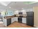Modern kitchen with granite counters and appliances at 12000 Gulf Blvd # 501-W, Treasure Island, FL 33706